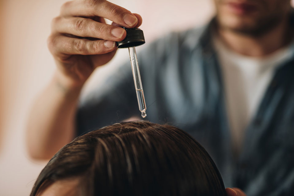 Topical vitamin D, minoxidil, and immunosuppressant medication may help prevent hair loss in cancer patients.